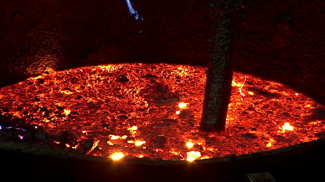 Steel Works. A huge barrel with the molten iron.