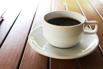 Black Coffee white cup on the table.