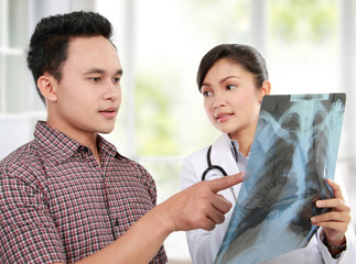 Female doctor with patient