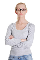 Portrait of a beautiful teen woman in glasses.