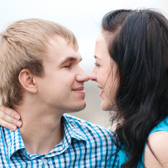 Portrait of a beautiful young happy smiling couple