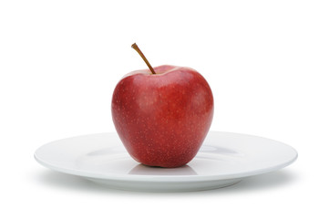Red apple on plate