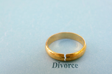 wedding ring with a crack in it ( divorce concept)