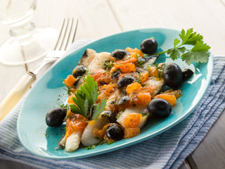 cod fillet with black olives and fresh tomatoes