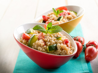barley risotto with zucchinis and fresh tomatoes