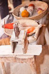 Vintage tools and natural wool to make ecological clothing