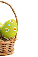 Easter eggs in a basket from left