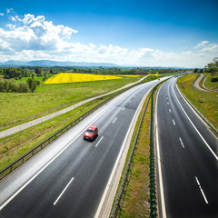 Obraz premium Two line, wide road with curve, highway