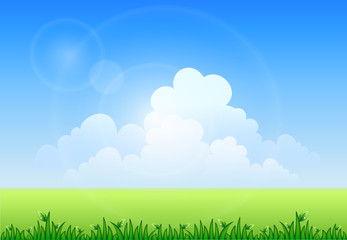 Obraz premium Blue sky and green grass