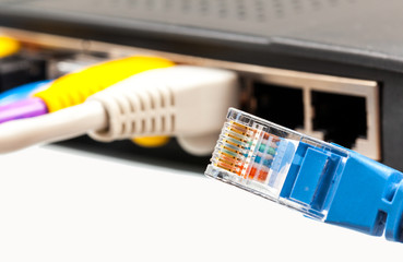 Cat 5 cables in multiple colors in router