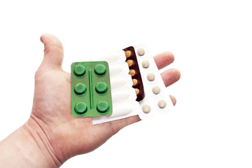 different tablets in a hand of the doctor
