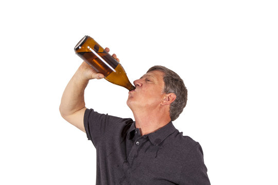 man drinking alcohol