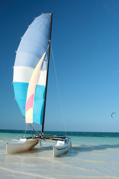 sailboat catamaran on tropical beach