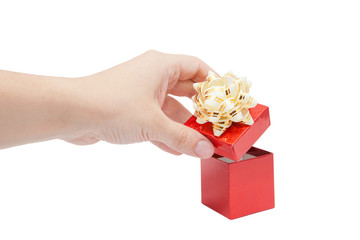 hand opening single red gift box with silver-beige ribbon