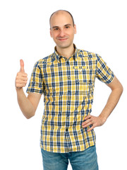 Naklejka premium Happy casual young man showing thumb up