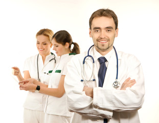 A team of young Caucasian doctors in white clothes