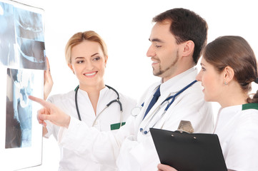 Fototapeta premium A team of young Caucasian doctors in white clothes