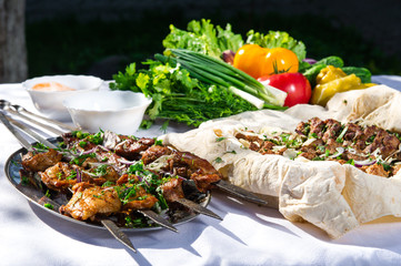 Shashlik with lavash and vegetables