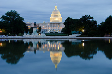 Capitol building with pool reflection at night,  Washington DC