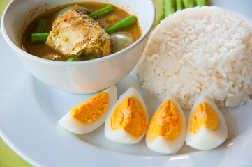 Thailand food : hot rice with vegetables, curry and boil egg