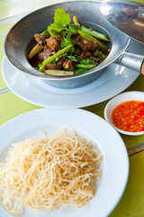 Baked goose with red pepper , chinese noodle and sauce