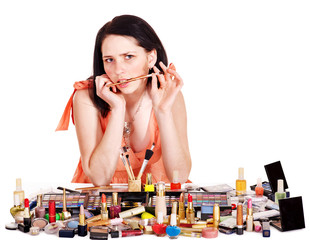 Girl applying makeup.