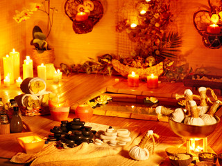 Luxury spa interior with burning candle.