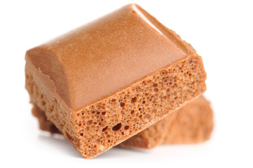 porous chocolate bars isolated on white