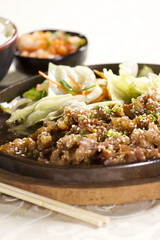 beef on pan, yakiniku beef fried on pan with vegetable.