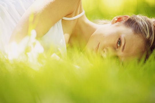 Woman Sleep On Grass