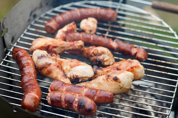 barbecue with delicious grilled meat on grill