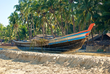Burmese boat on the shore