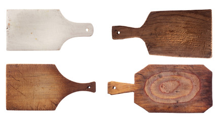 four old used chopping kitchen boards, isolated over white