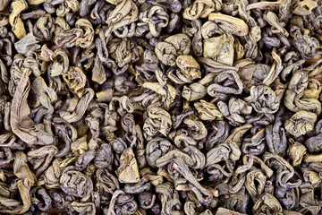 Dried green tea leaves texture