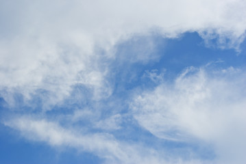 white clouds in blue sky.