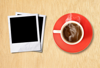 Fototapeta na wymiar cup coffee and photo frame