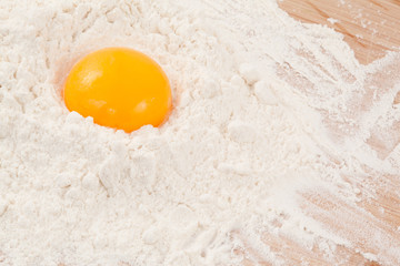 Egg yolk on the flour