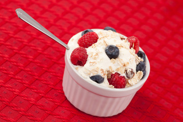 Pot of berries and whipped cream
