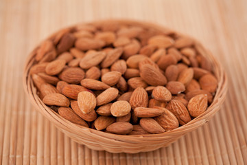 Bowl full of roasted almonds