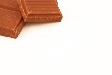 Two pieces of milk chocolate