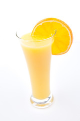 Full glass of orange juice with orange slice