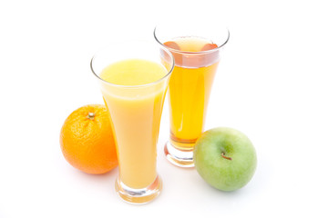 Glass of apple juice near a glass of orange juice