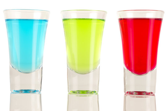 Shots - 3 shot glasses filled with colourful drinks
