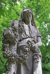 Fototapeta premium Historical cemetery statue by Jackie DeBusk
