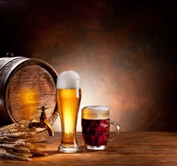Tuinposter Beer barrel with beer glasses on a wooden table. © volff
