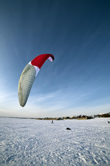 Ski kiting on a frozen lake © HolyLazyCrazy