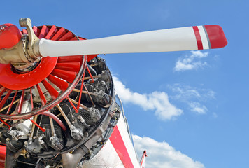 Old aircraft against blue sky