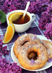 Breakfast of donuts and tea
