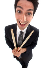 Businessman holding drum sticks