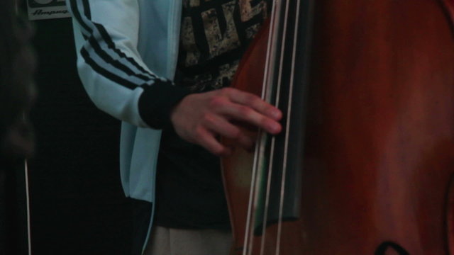 Musician playing on a contrabass
